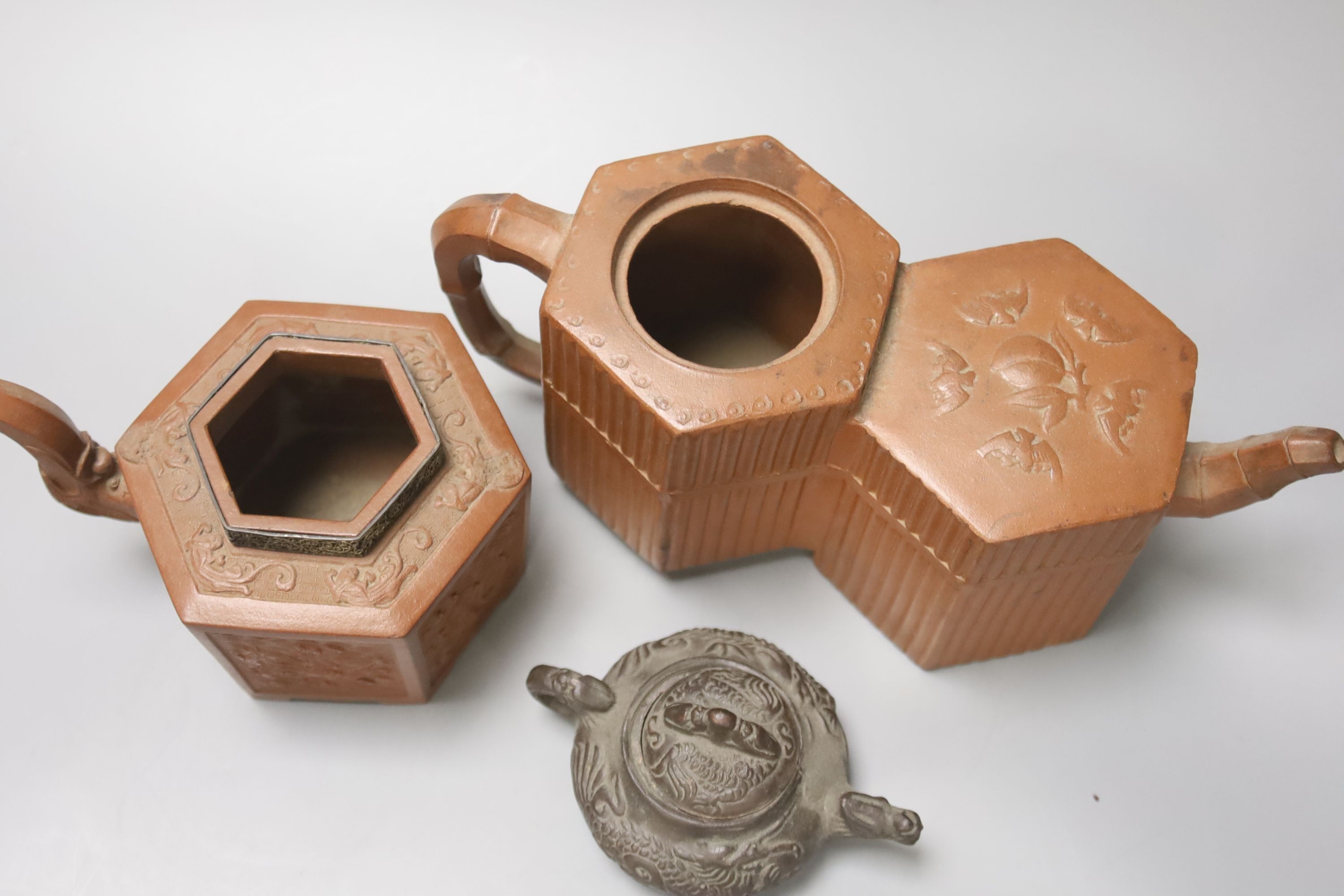 Two 19th century Chinese Yixing teapots (no covers) and a later Yixing miniature teapot